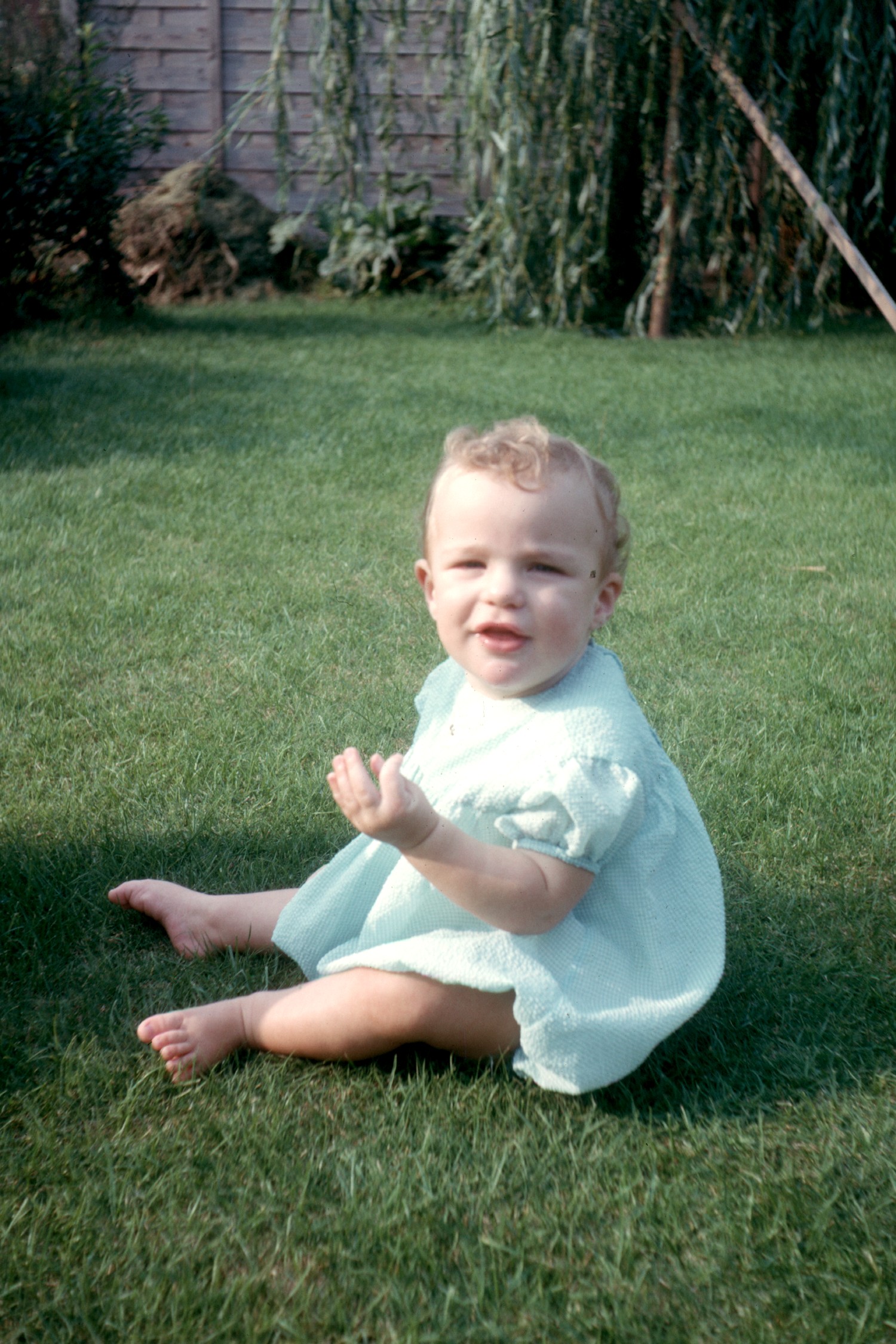 6400802s May 1964 - Simon at 7 months sitting up in the garden at Yateley.