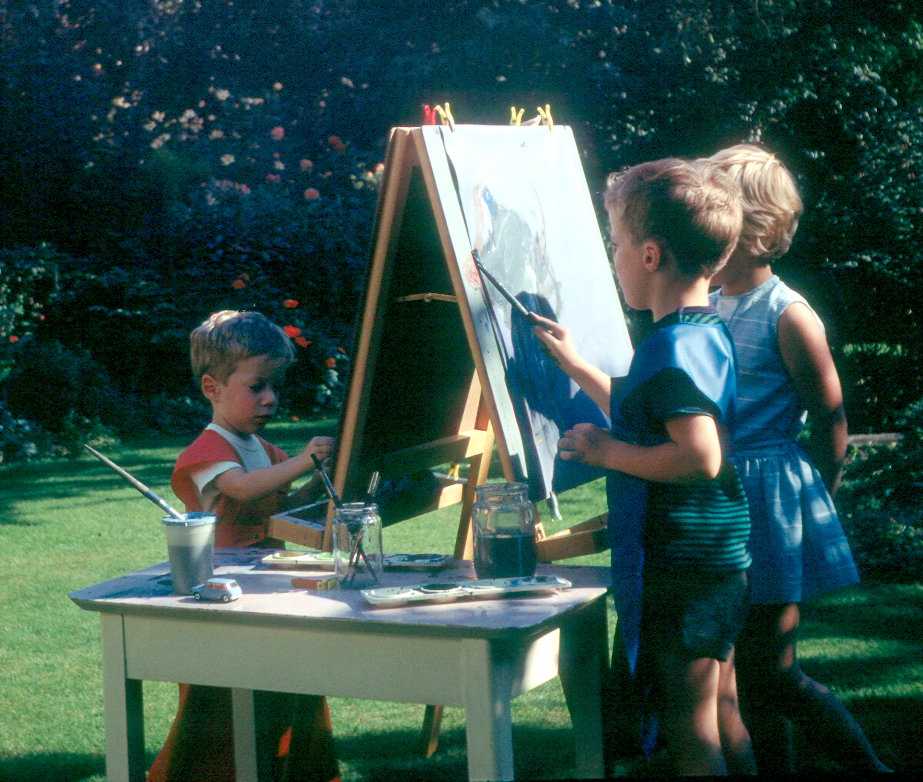 6701421k August 1967 - Nicola watches while Simon paints.