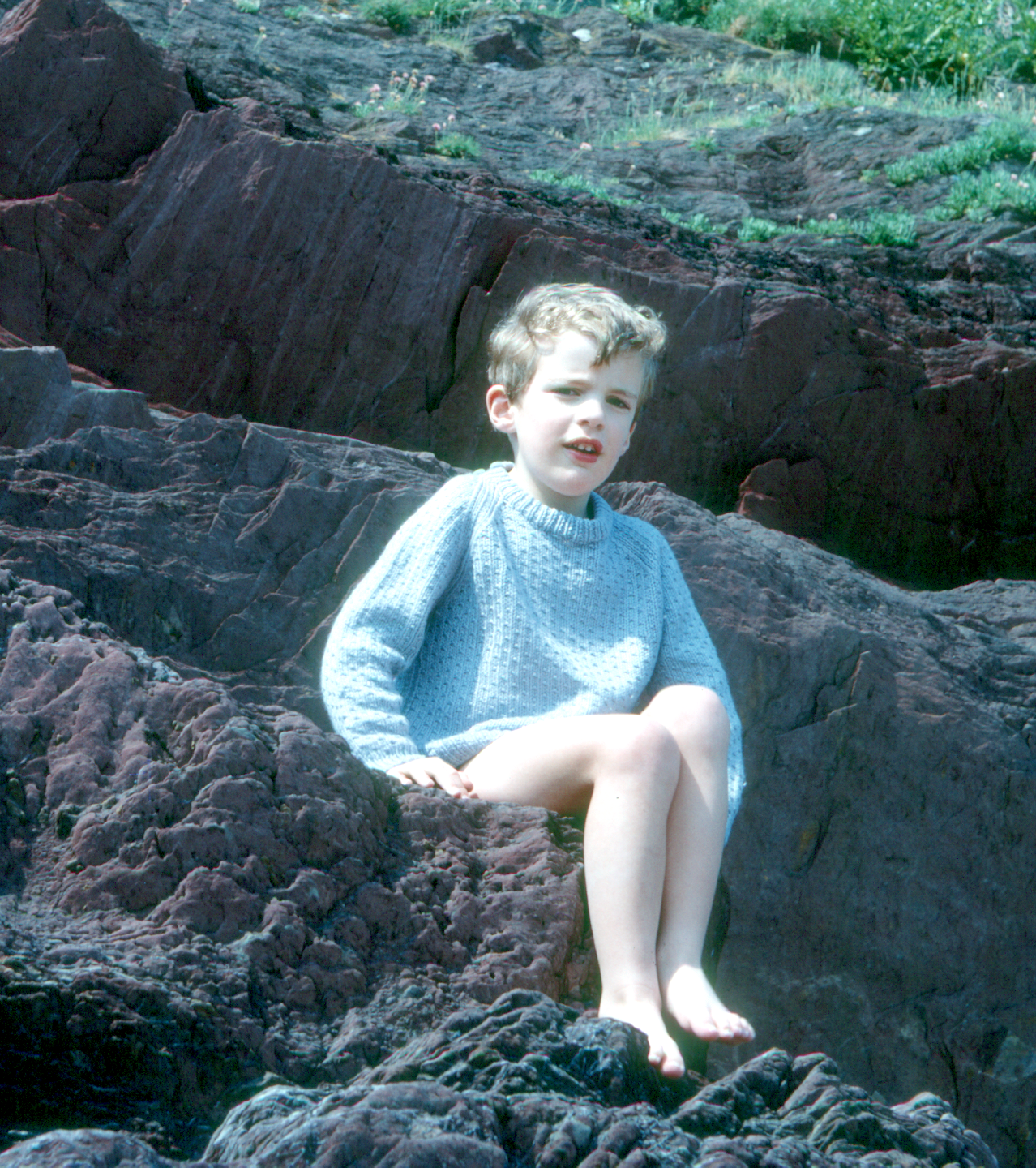 6801611k May 1968 - Simon on the rocks at Talland Bay.