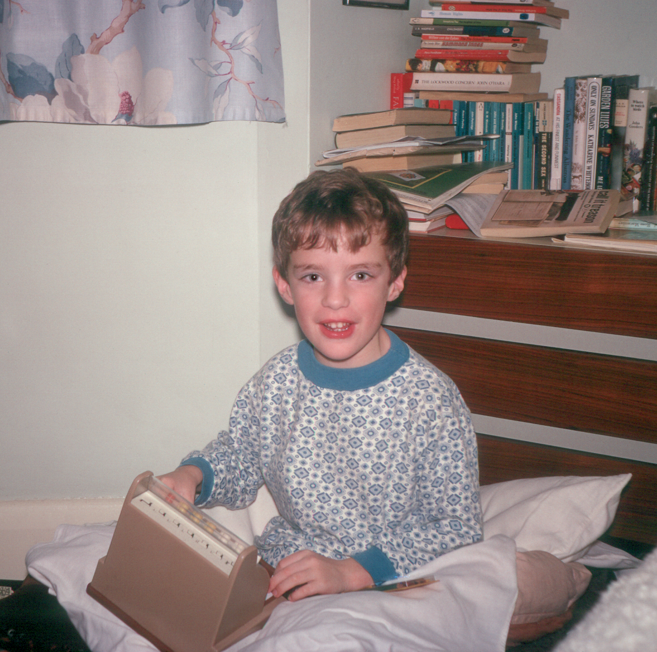 6801835k Christmas 1968 - Simon with one of his Christmas presents in bed in Mum & Dad's bedroom at Hampton.