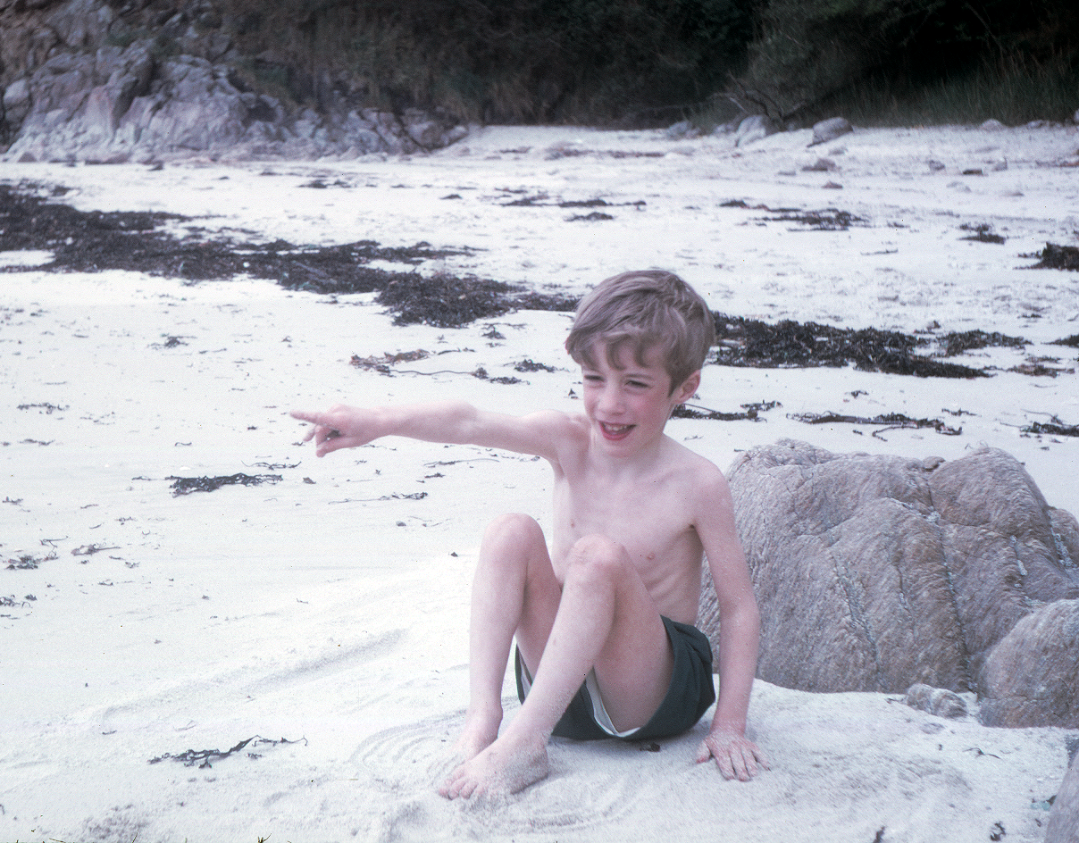 7102108k May 1971 - Jon on the beach at Benodet in Brittany.