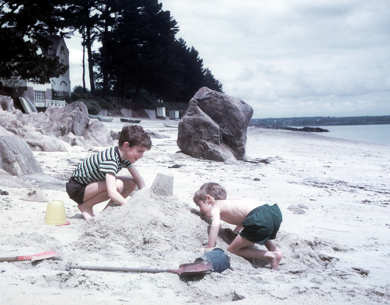 7102110k May 1971 - Simon & Jon building sandcastles at Benodet.