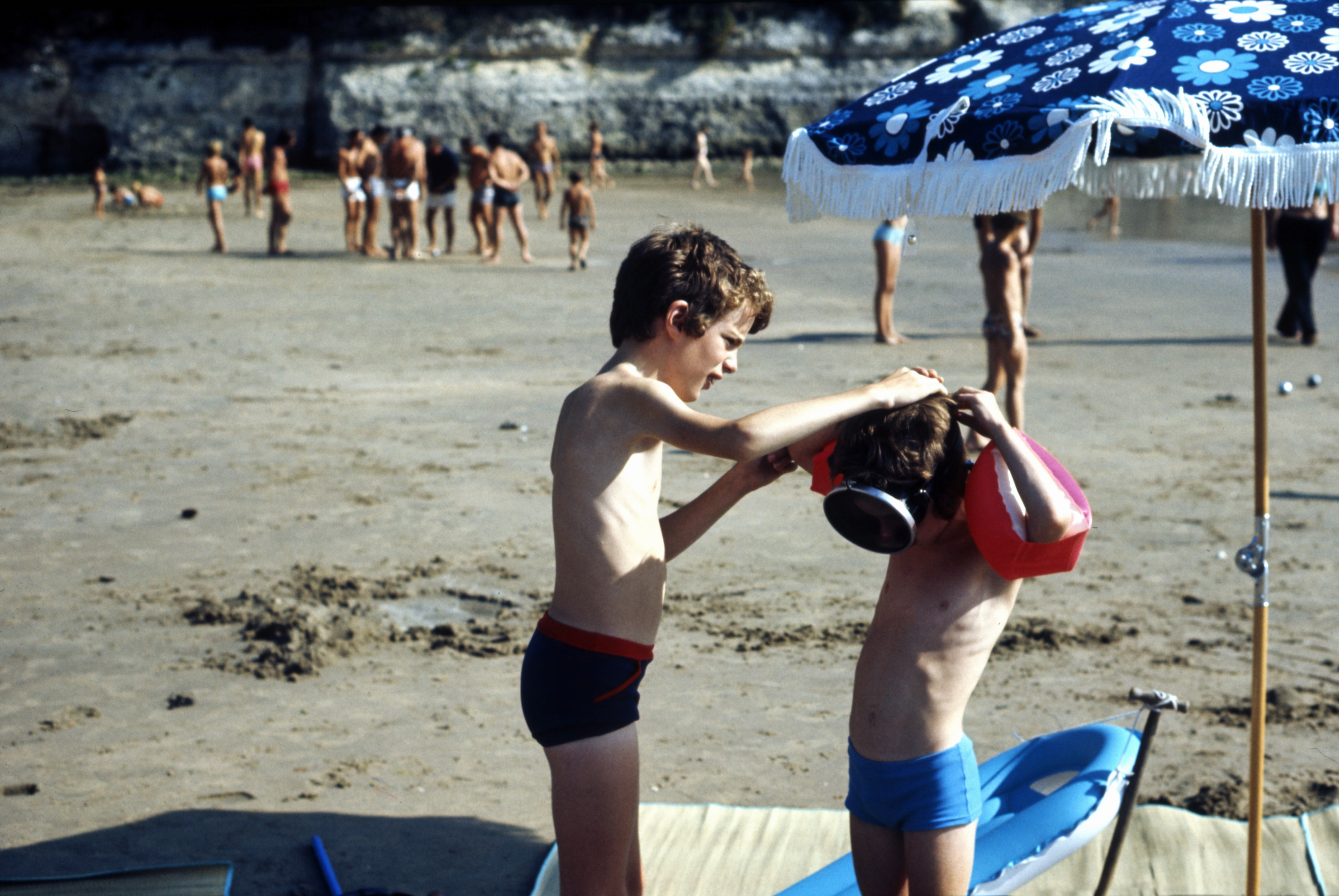 7303812 August 1973 - Simon helps Jon get ready for his swim