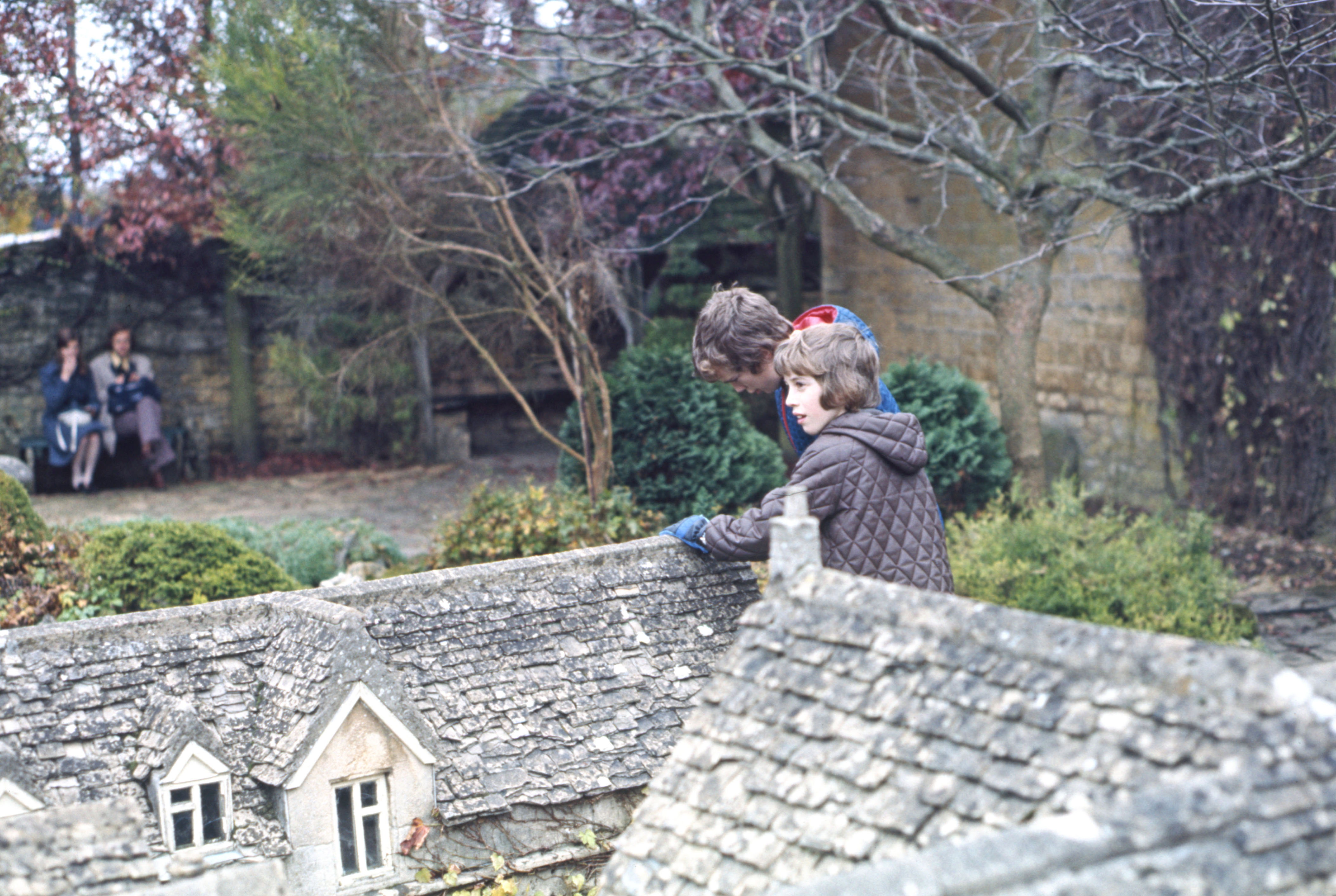 7404621 October 1974 - Simon and Jonathan are visiting the model village at Bourton-on-the-Water.