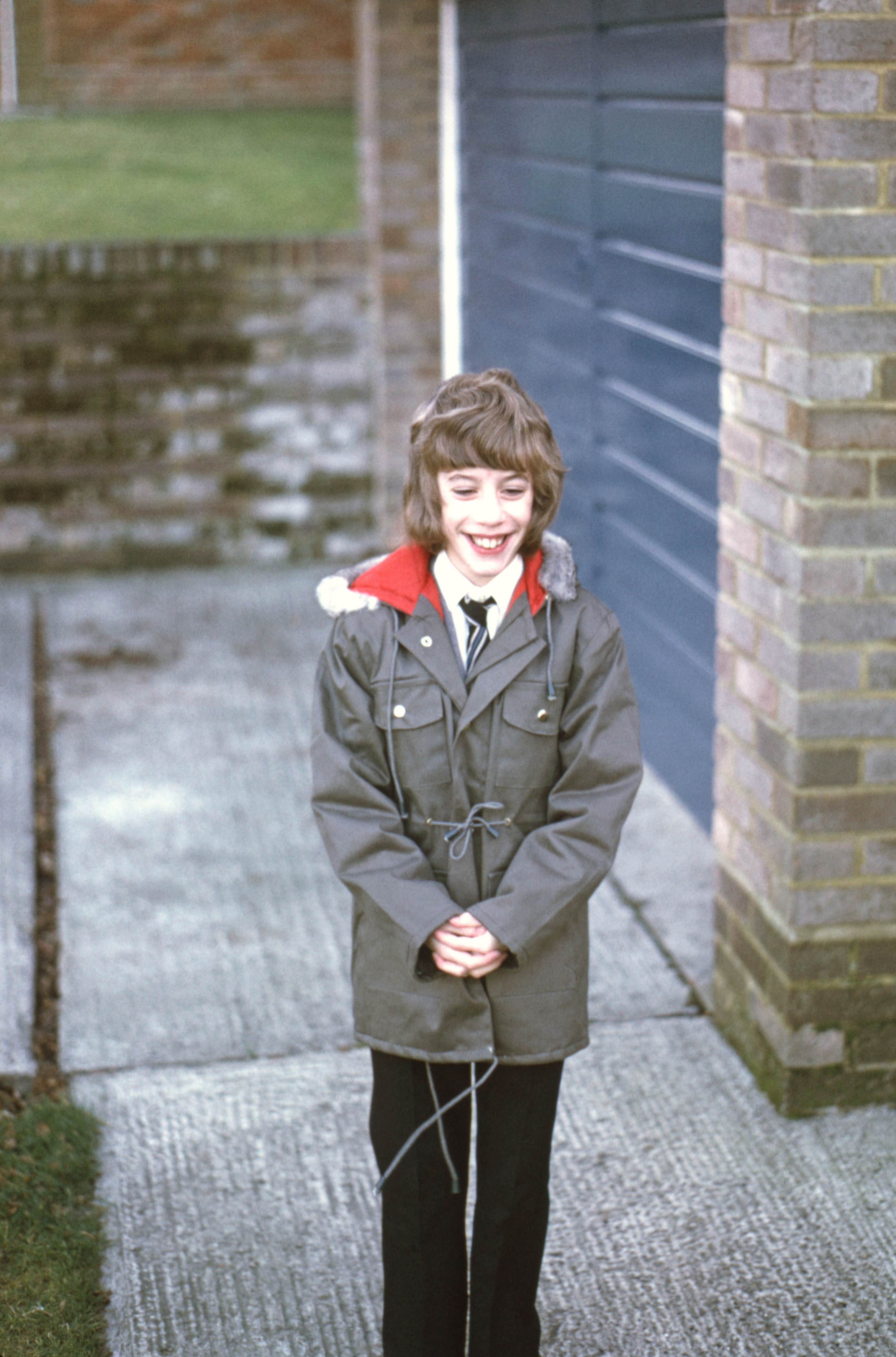7504716 December 1974 - Jon is off to school in his new parka which was bought at the end of November.