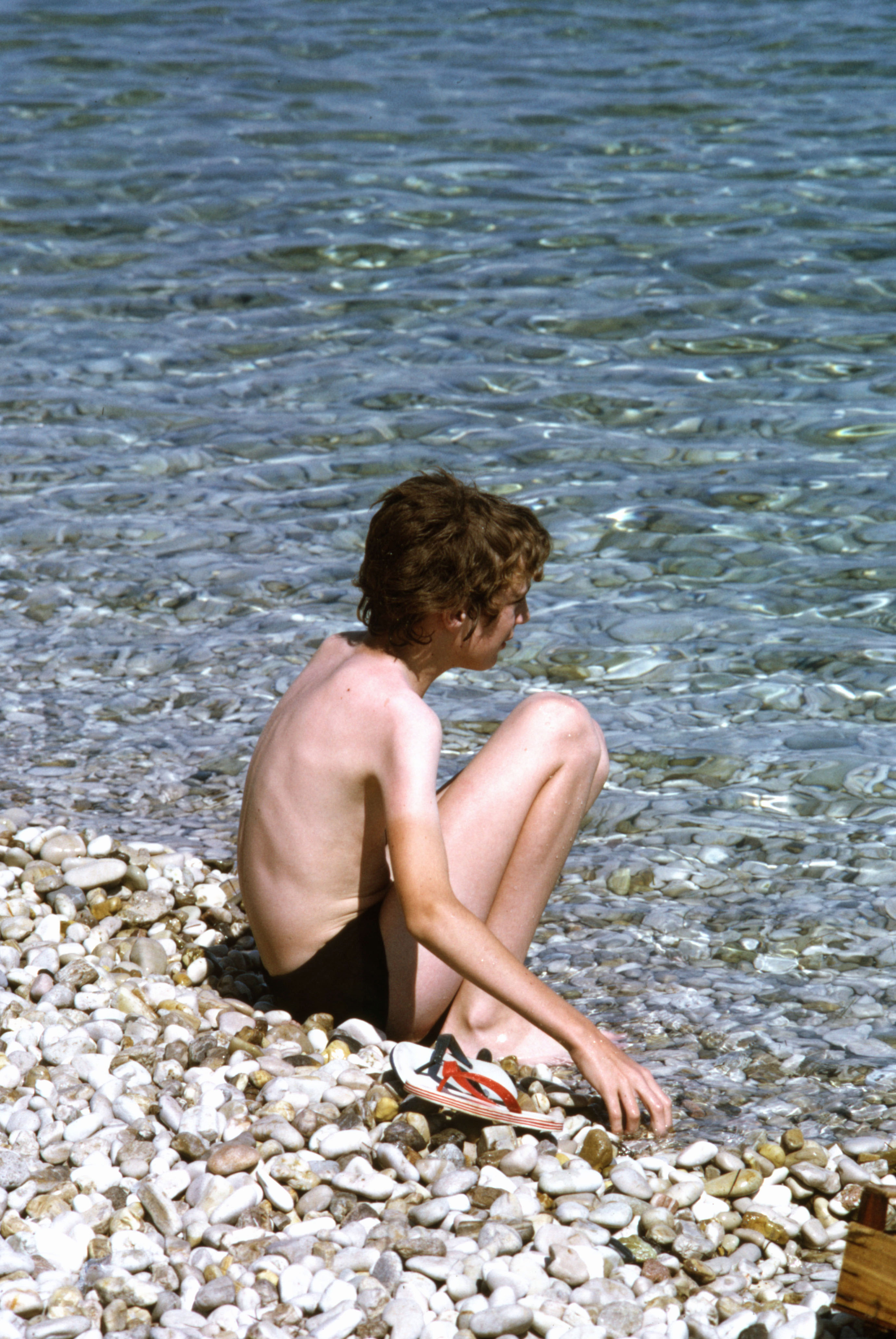 7605722 August 1976 - Simon on the beach at Corfu.