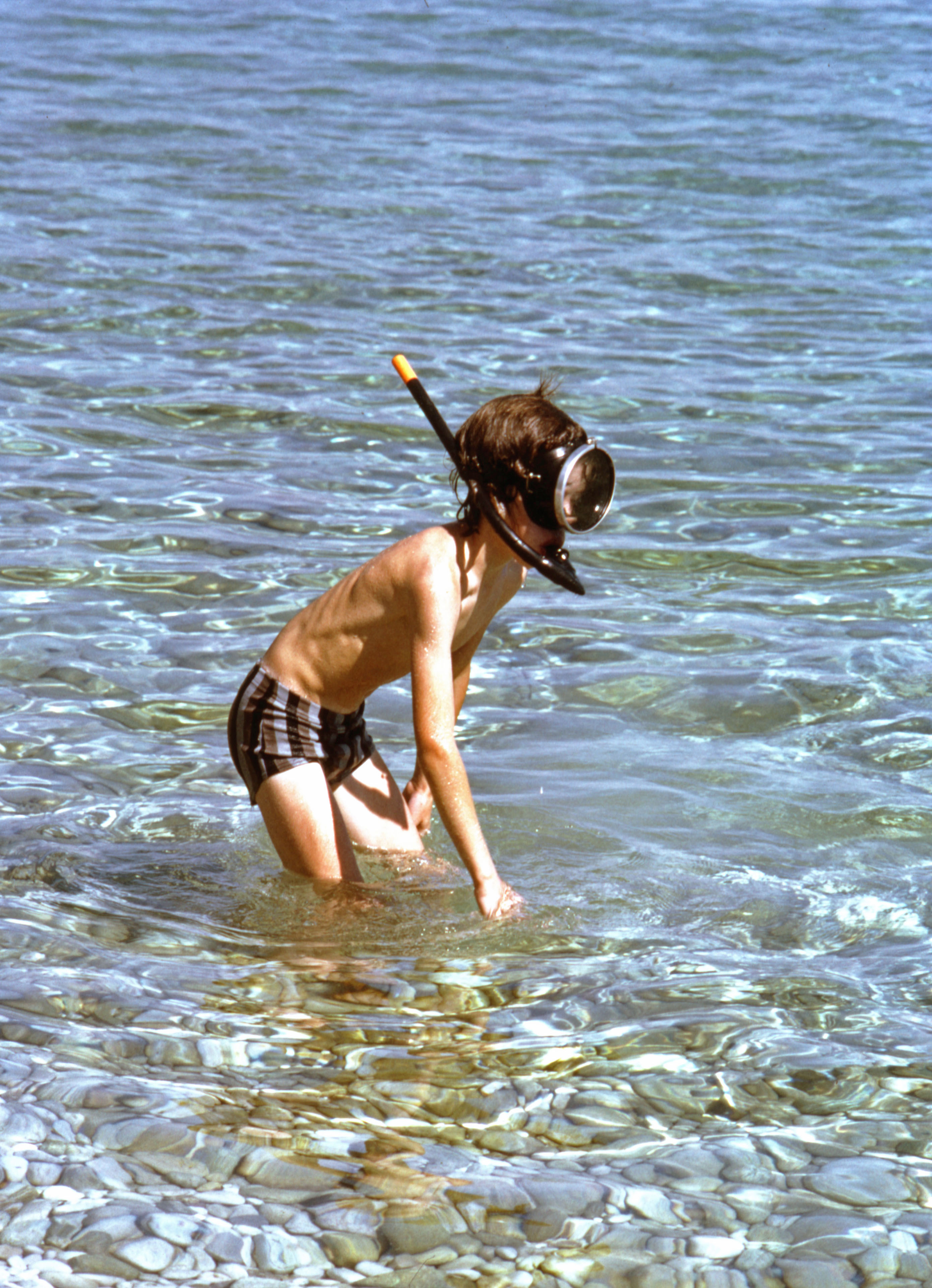 7605723 August 1976 - Jon prepares to go for a swim.