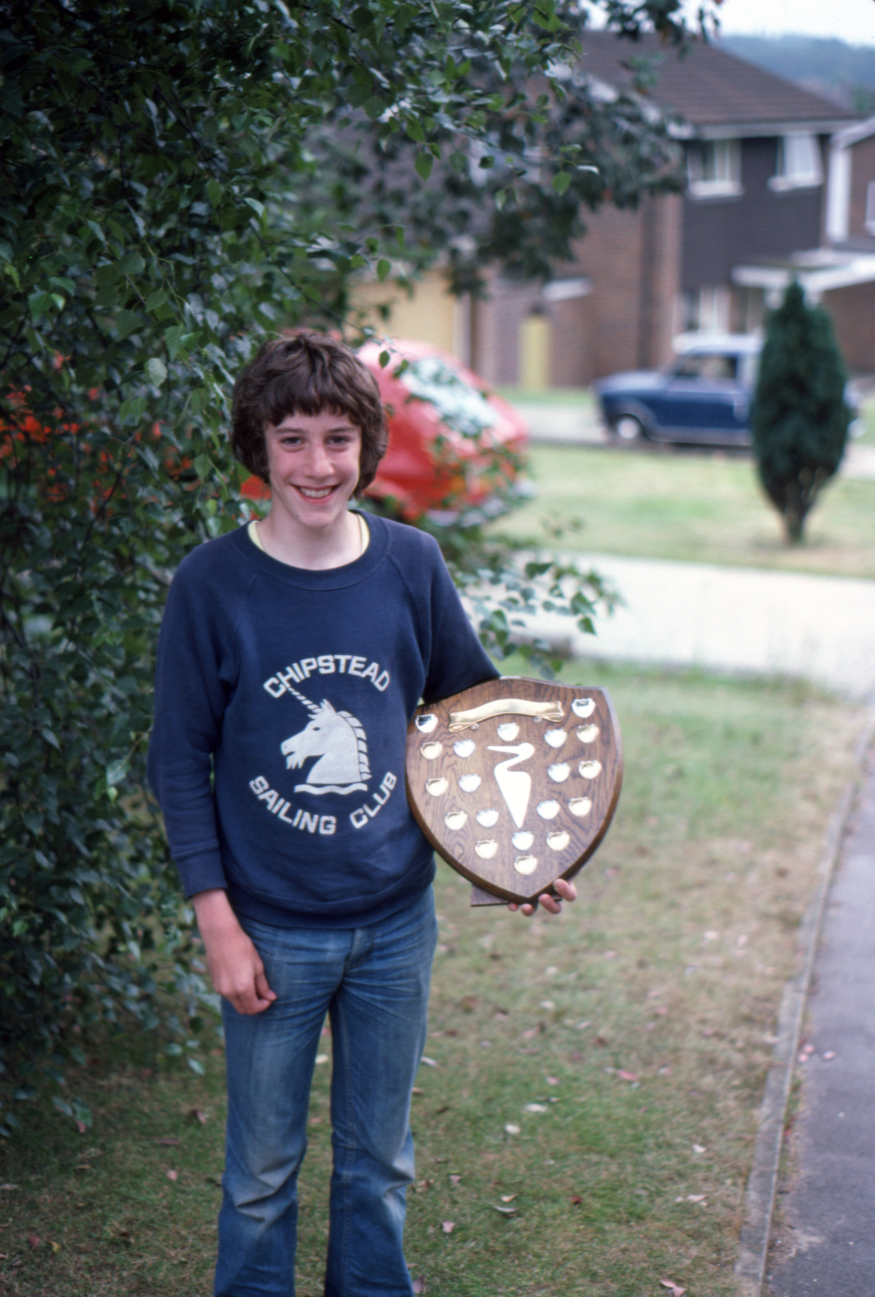 7906807 7 July 1979 - As you can see, John won the Championship. Here he is with the trophy outside our house in Croydon.
