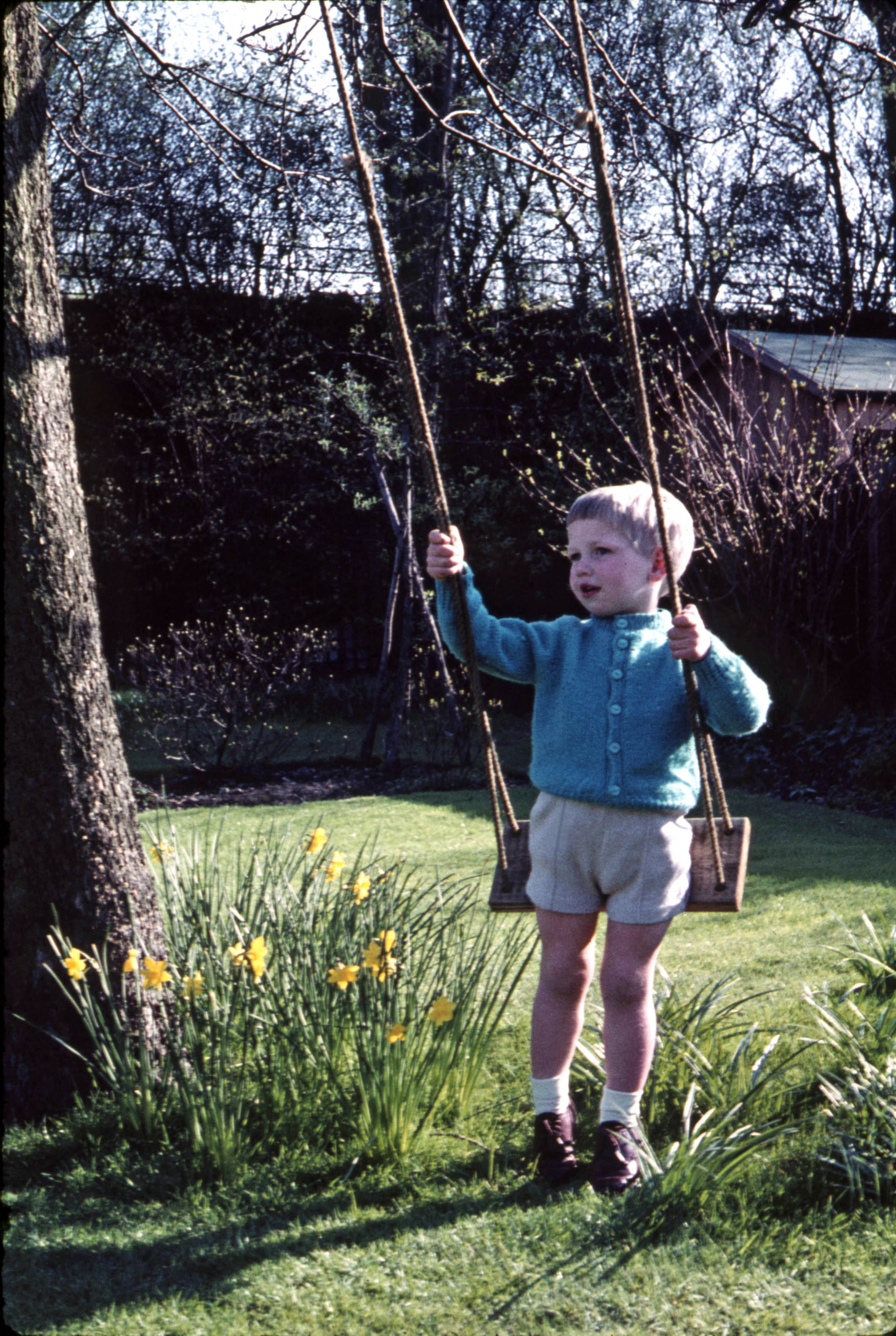 22 April 1962 Peter on his swing at the end of the garden at Hampton