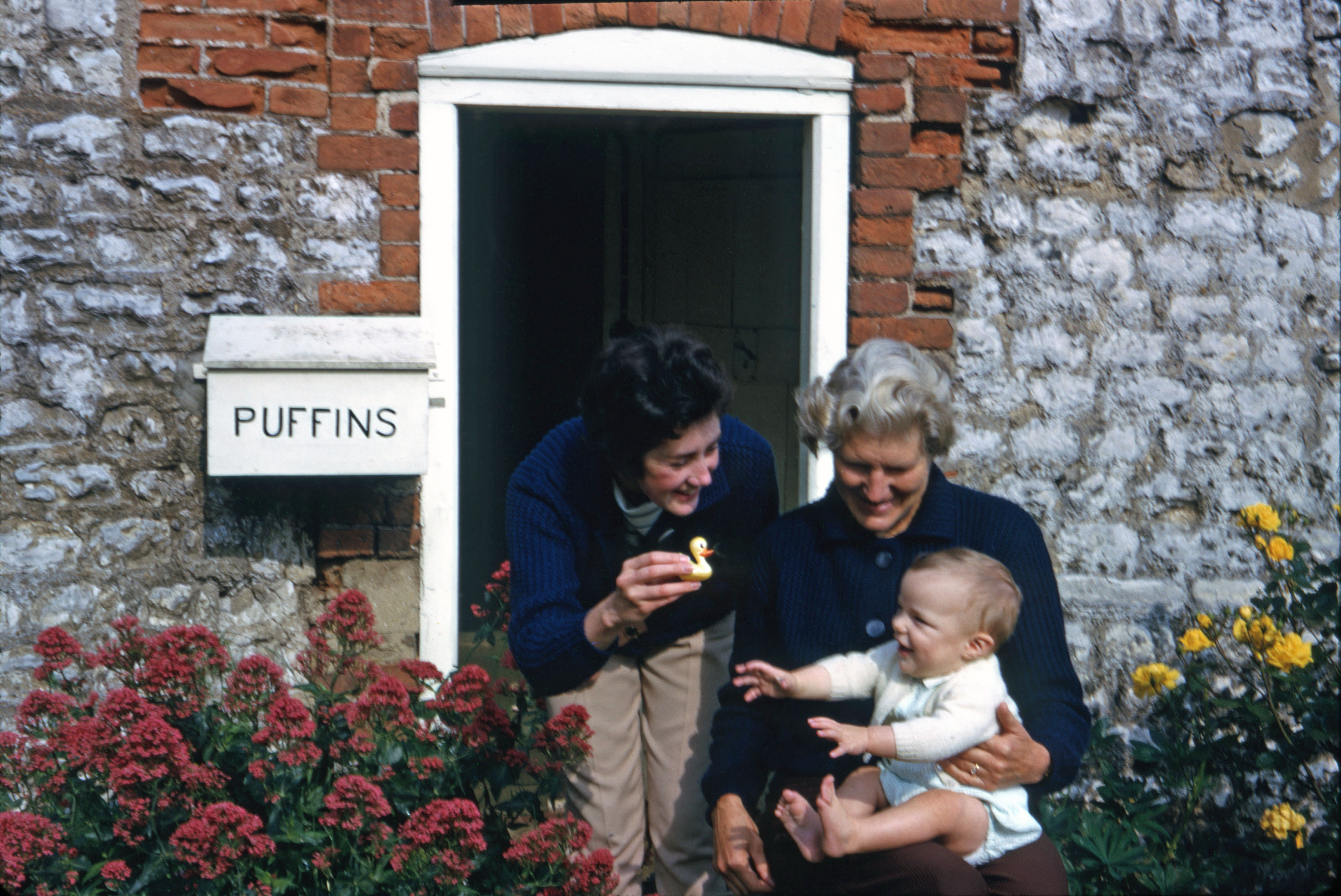 June 1964 Joan and Betty with Simon outside Puffins