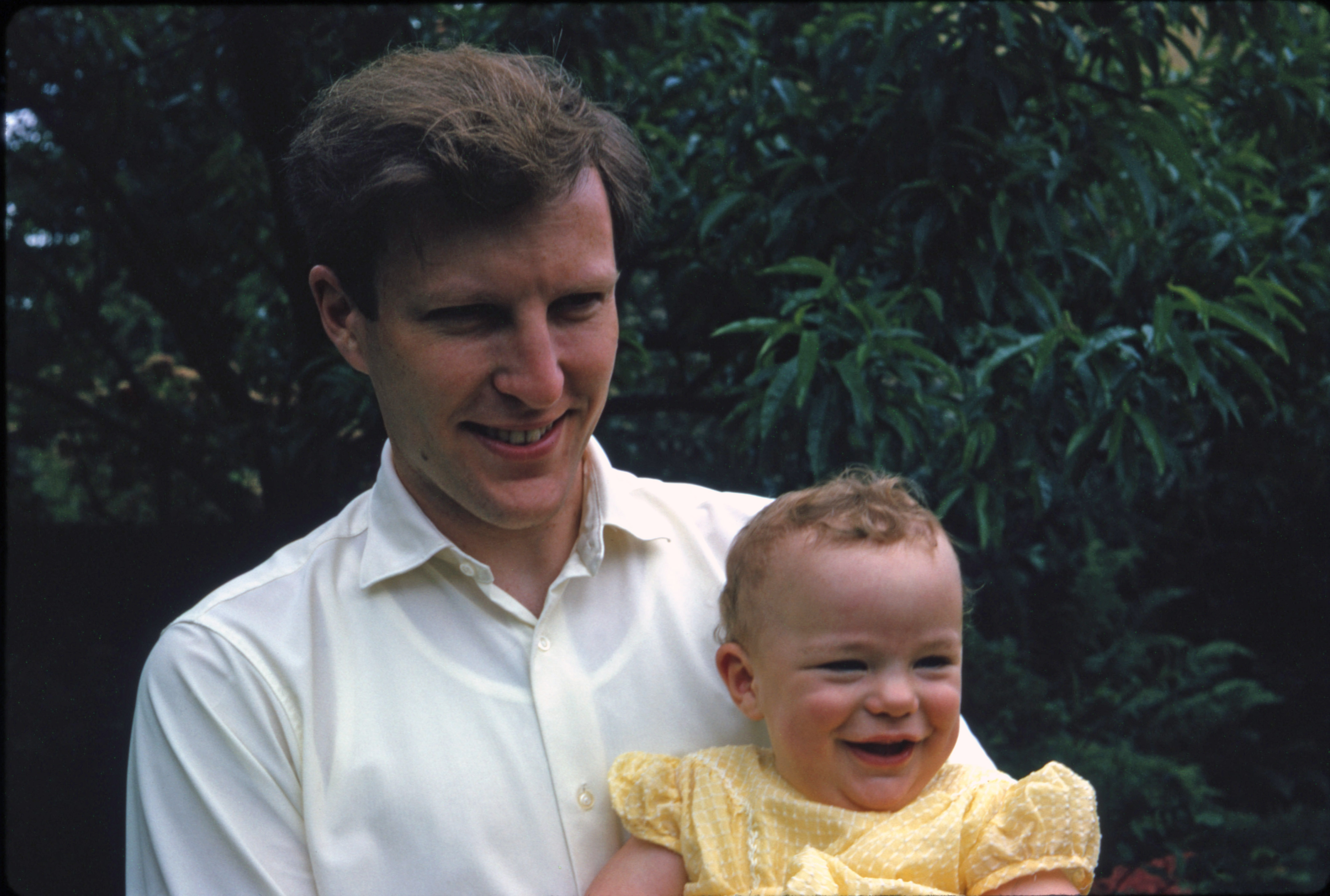 July 1964 Malcolm holding Simon