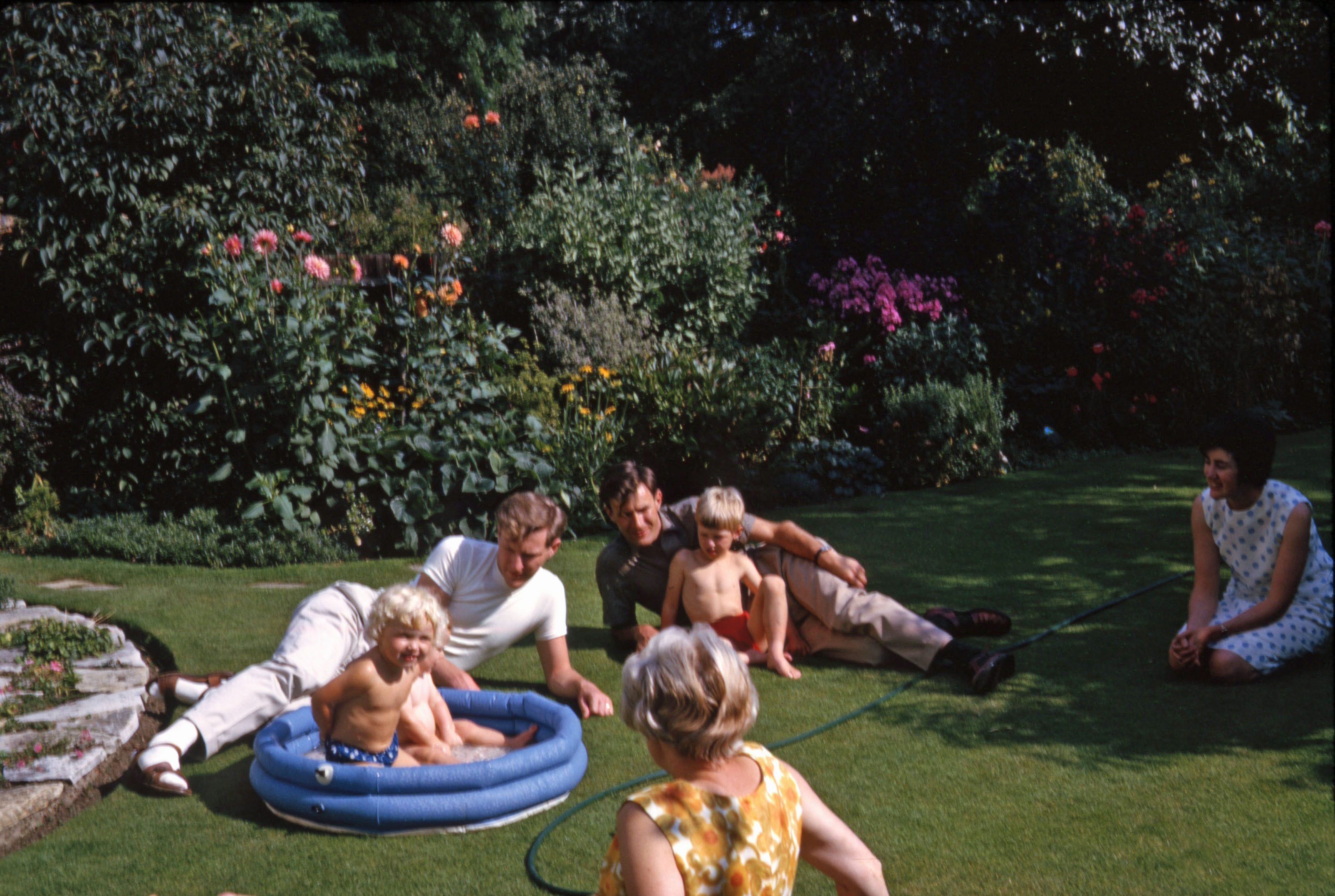 9 Aug 1964 Anthony, Malcolm and their families with Nicola and Simon in the pool