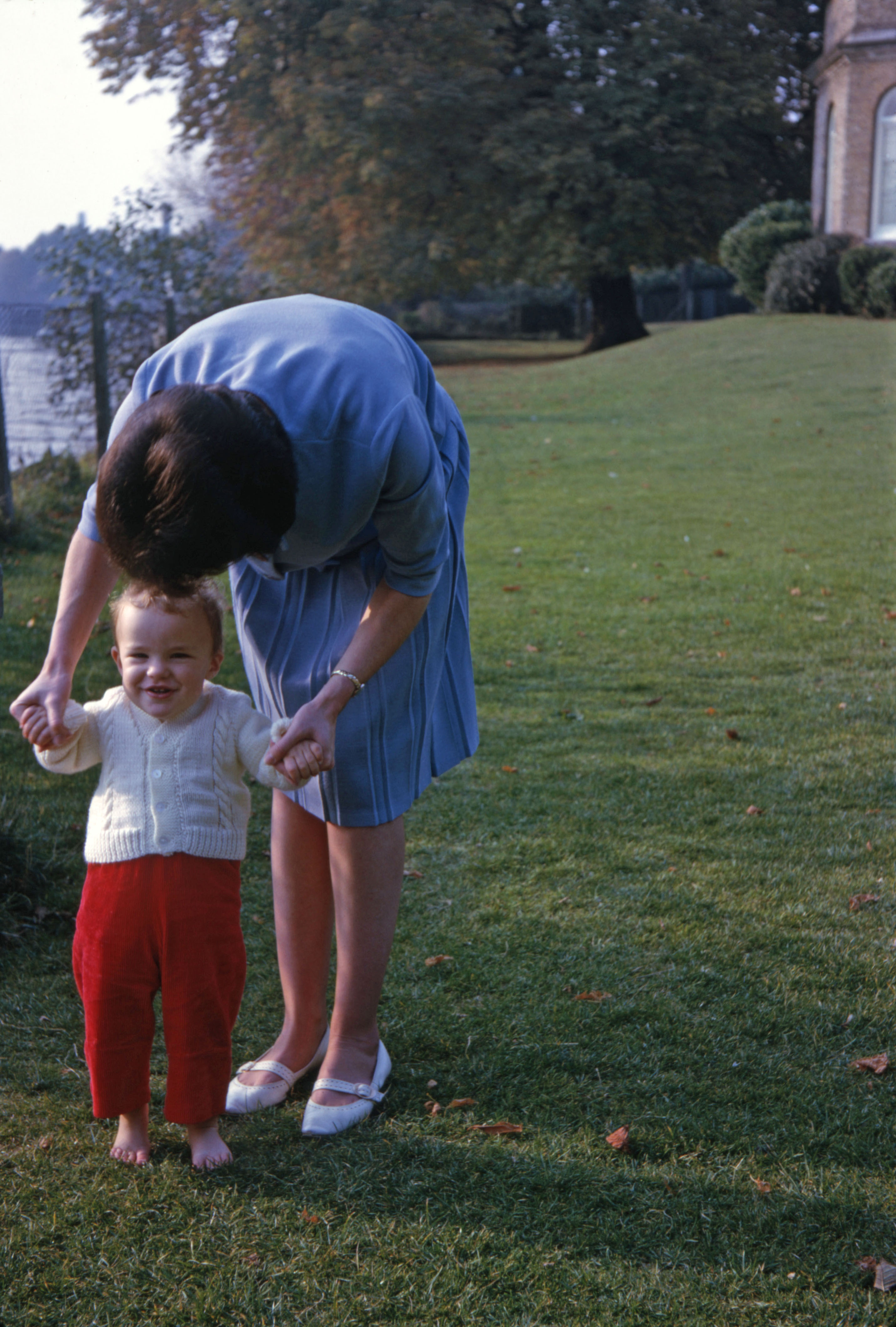 October 1964 Betty is trying to get Simon to walk!