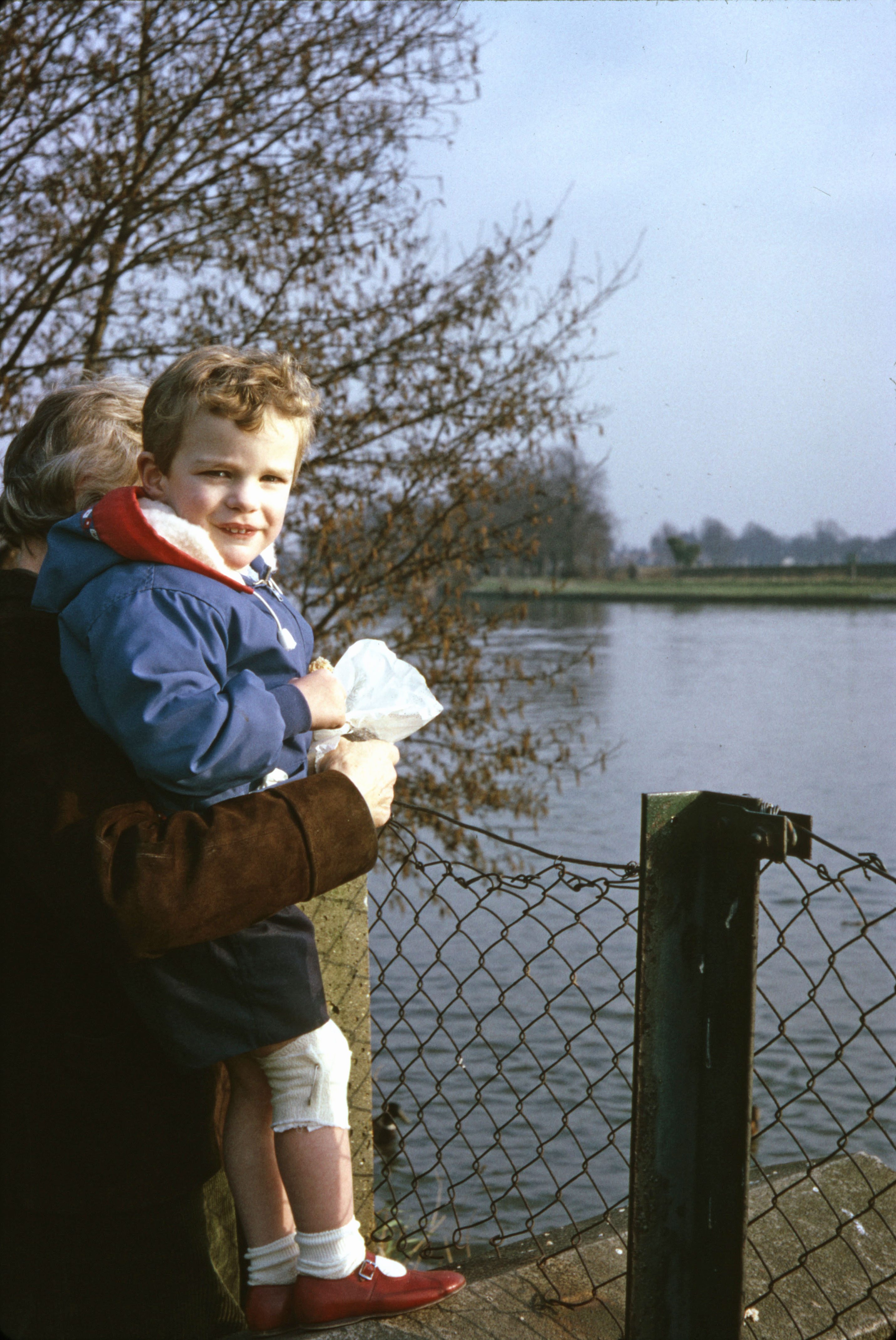 19 Mar 1966 Simon held by Joan by the river at Hampton