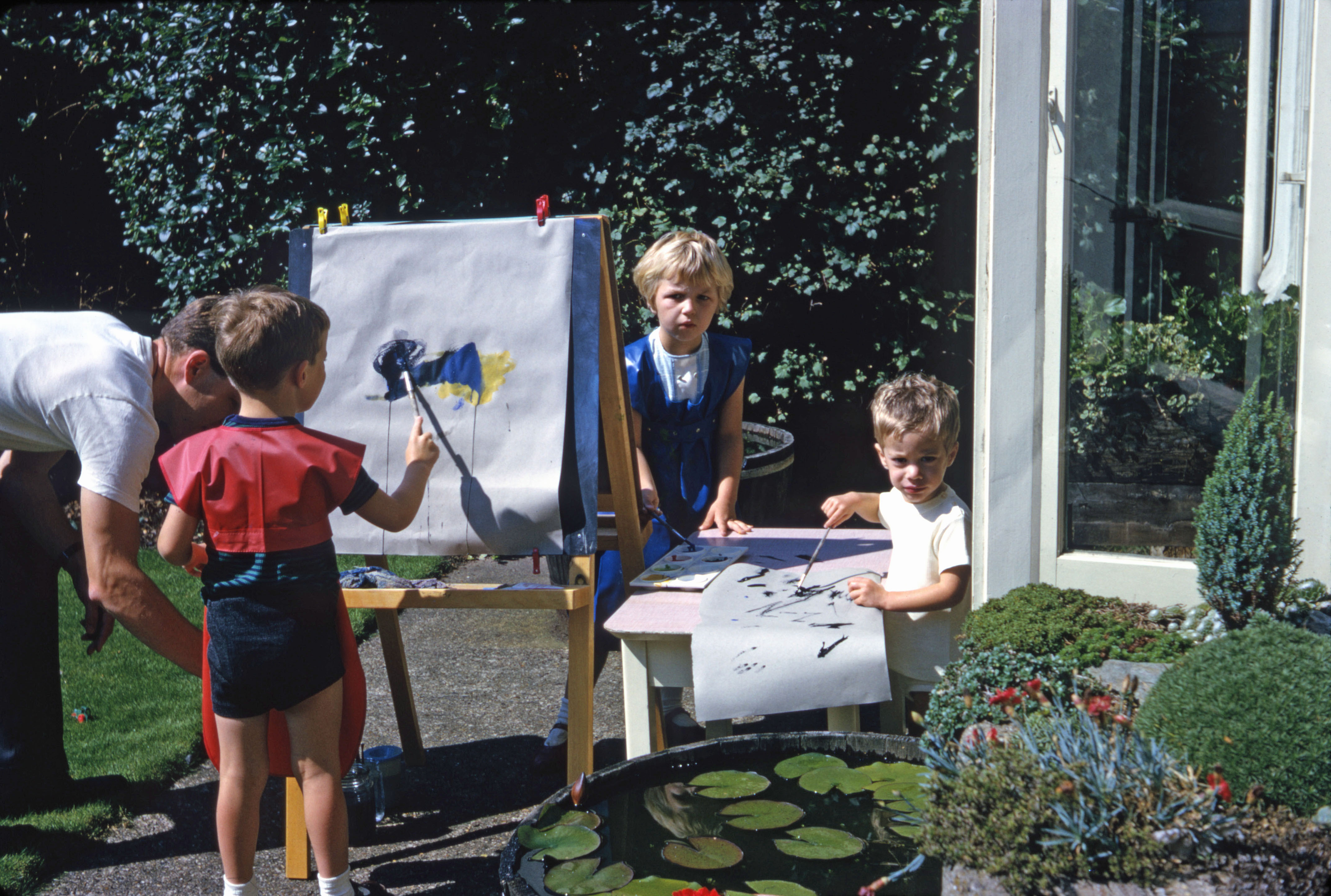 Summer 1967 Painting at easel with Simon, Nicola and Jonathan.