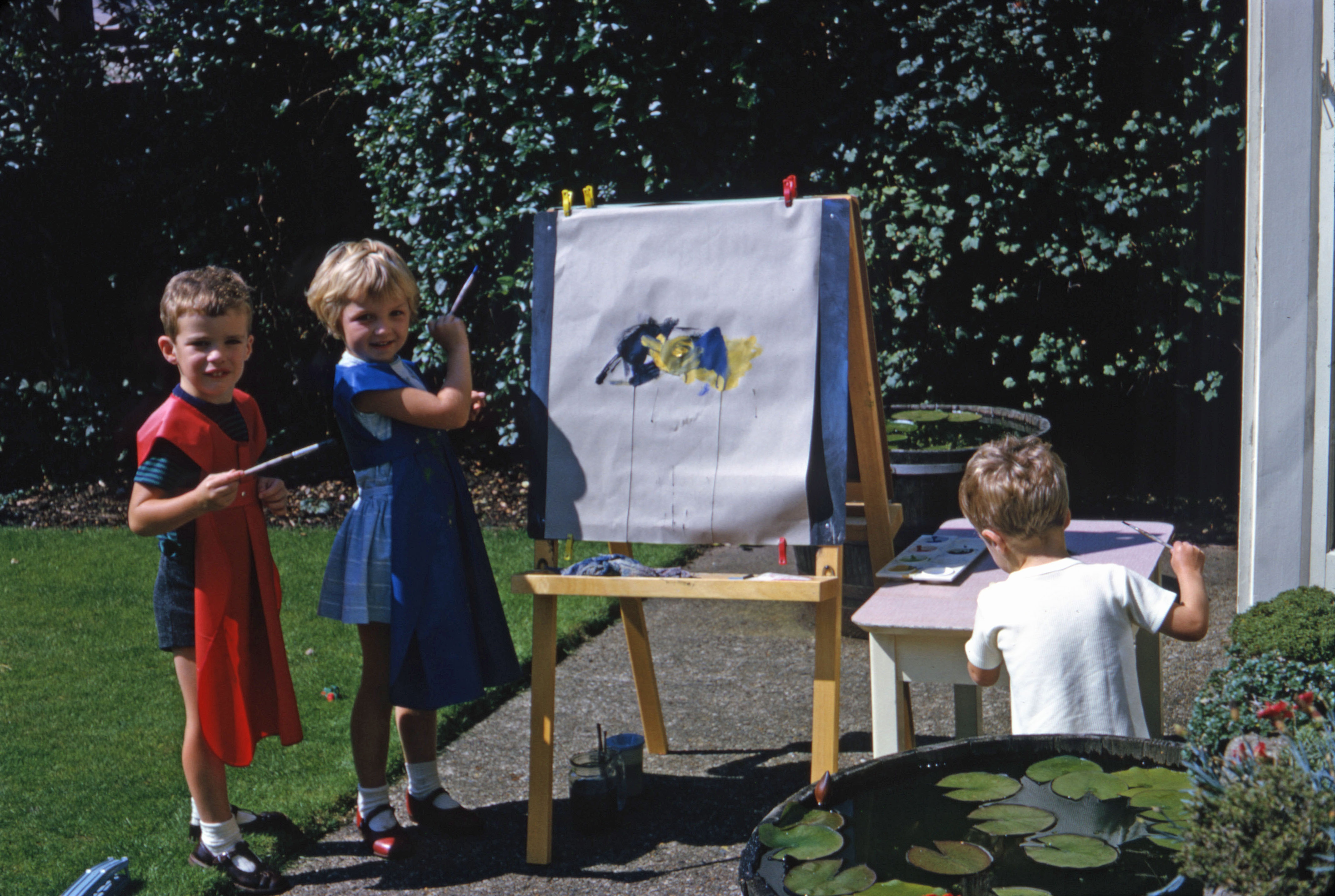 Summer 1967 Painting at easel. Simon, Nicola and Jonathan at Hampton