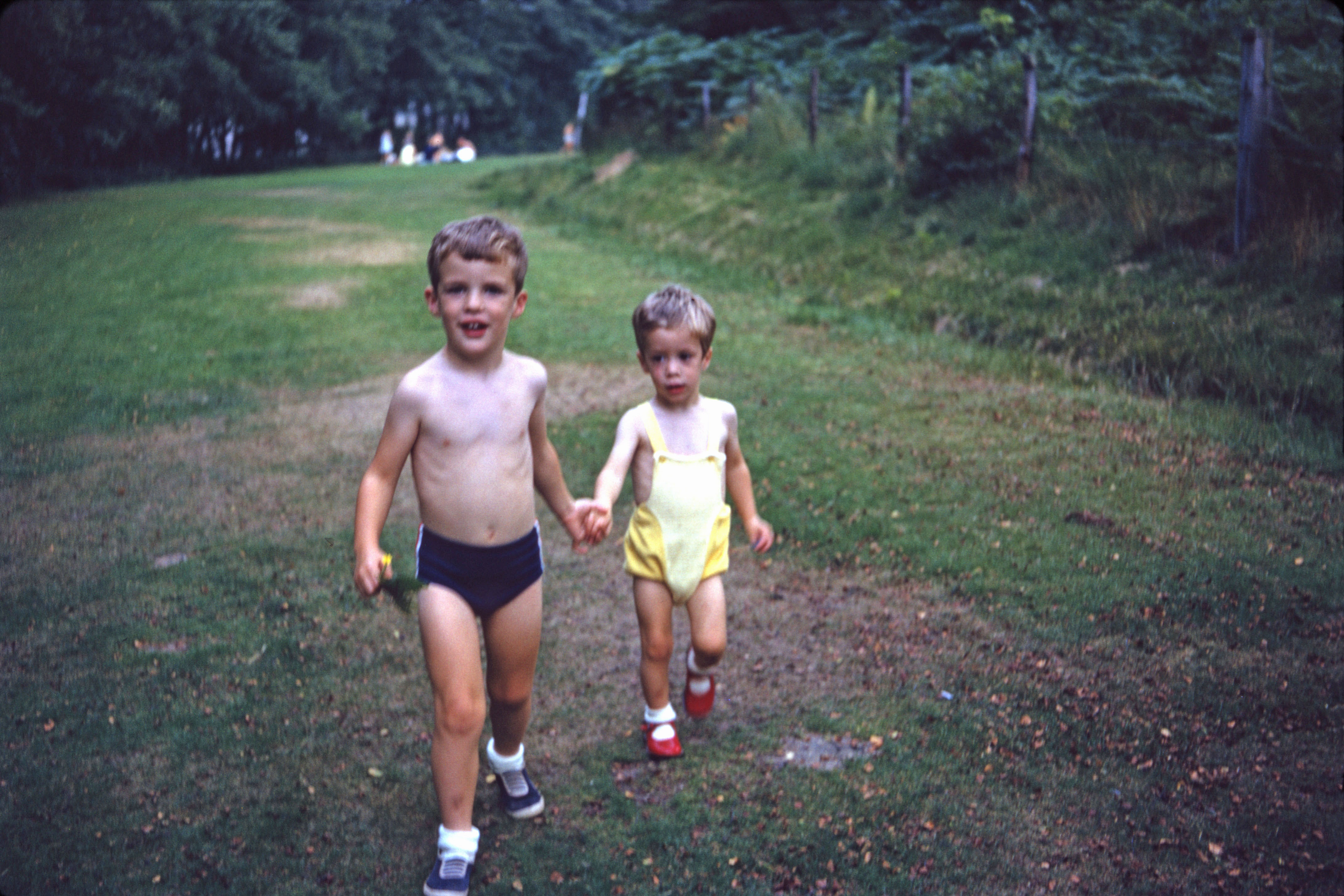 Summer 1967 Simon leads Jonathan at Virginia Water.