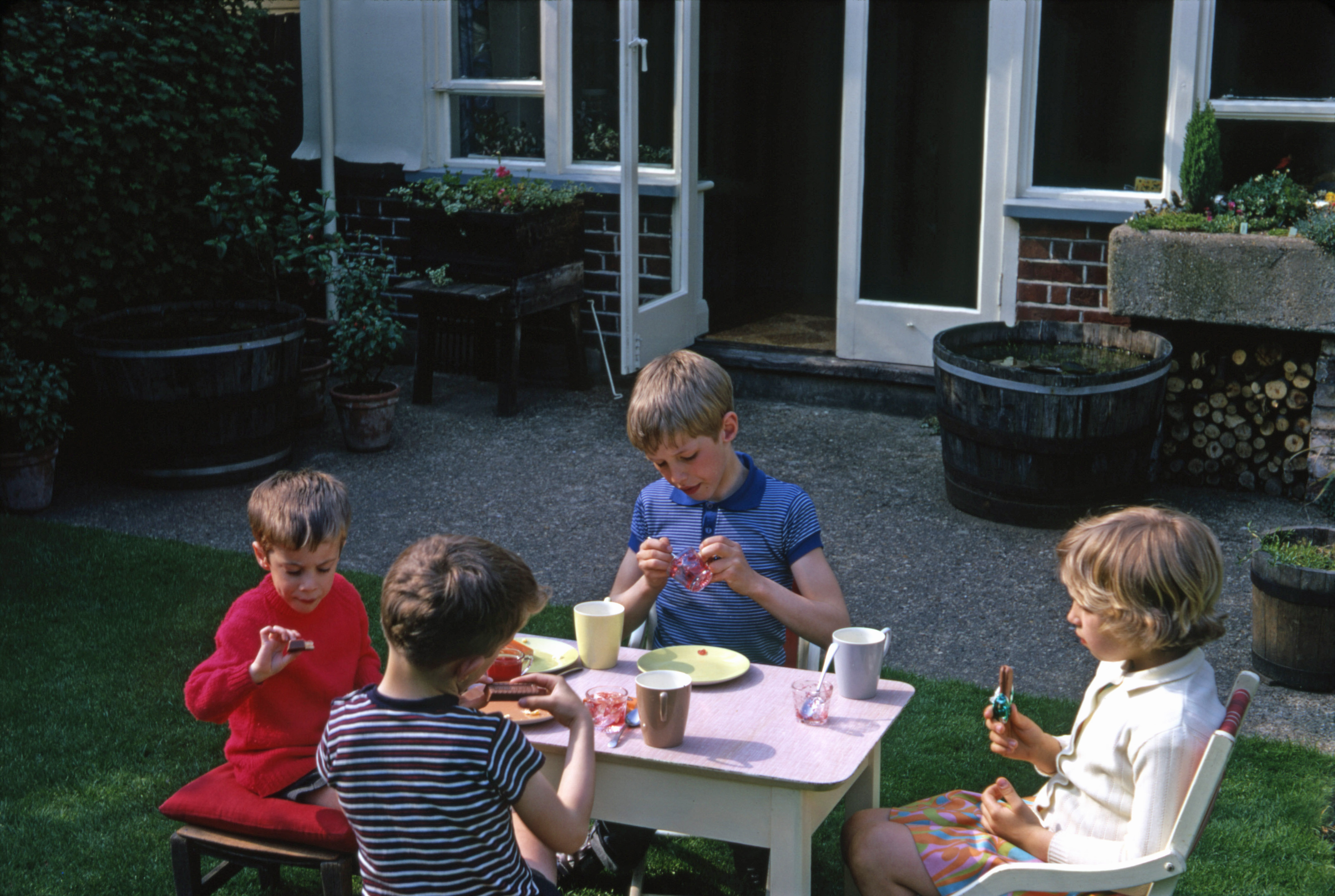 May 1969 A drink and biscuits in the garden at Hampton.
