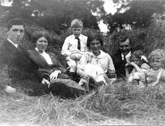Cecil Gay, Edith, Robert, Edith Gay, Charles, Joan and Fred in the Gay's hayfield Cecil Gay, Edith , Robert, Edith Gay, Charles, Joan and Freddie in the Gay's hayfield in about 1913