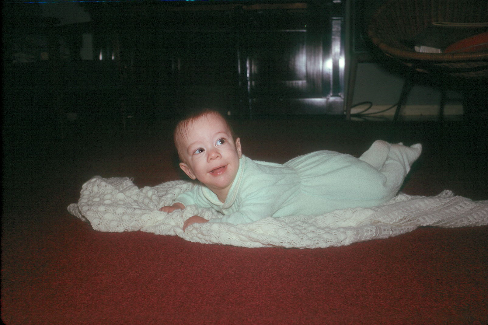 6501104k December 1965 - Jonathan on our living room floor at Yateley. Our original piano is in the background.